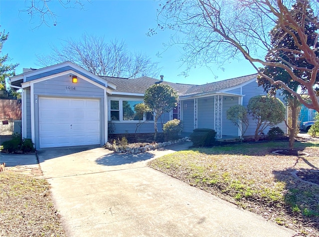 ranch-style house featuring a garage