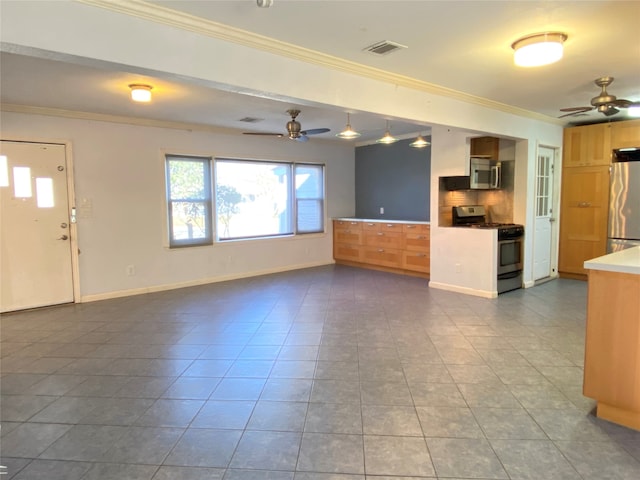 unfurnished living room featuring tile patterned floors, ornamental molding, and ceiling fan