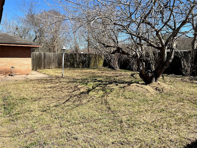 view of yard with fence