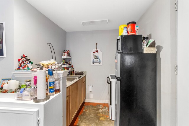 kitchen featuring stainless steel refrigerator