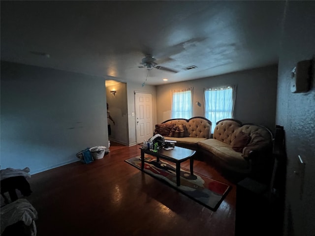 living room with ceiling fan and hardwood / wood-style flooring