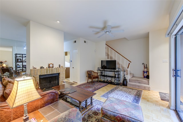 living room featuring light parquet flooring and ceiling fan