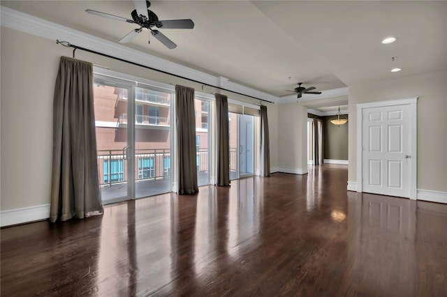 unfurnished room with ceiling fan and dark hardwood / wood-style floors