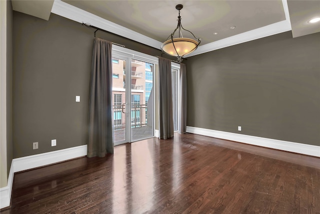 unfurnished room with dark hardwood / wood-style flooring