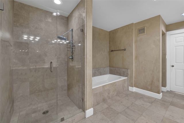 bathroom with plus walk in shower and tile patterned floors