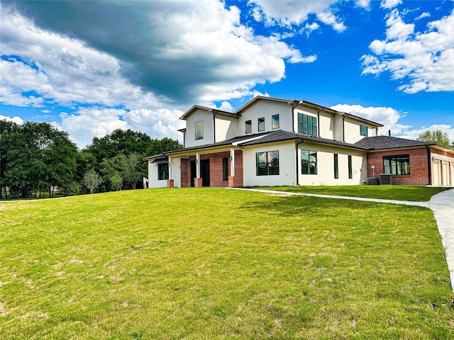 view of front of home with a front yard