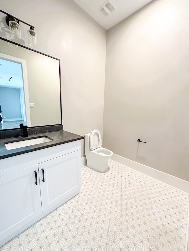 bathroom featuring tile patterned floors and vanity