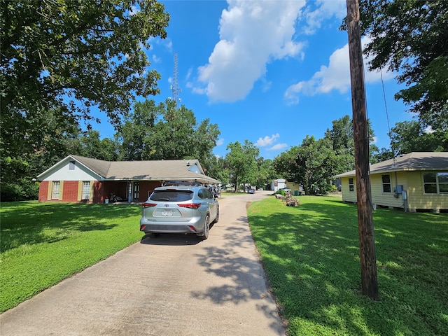 view of front facade with a garage and a front yard