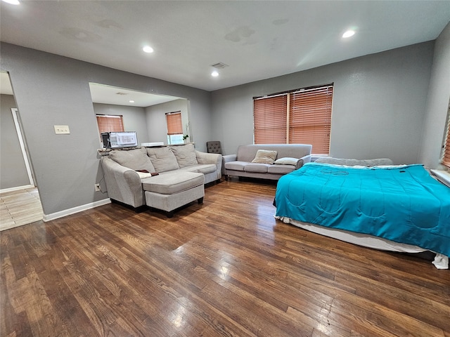 bedroom featuring wood-type flooring