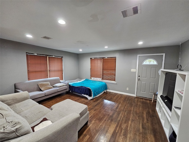 bedroom with hardwood / wood-style floors