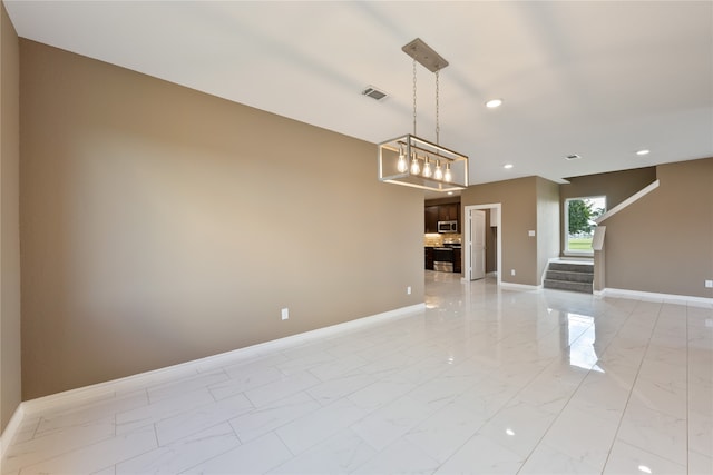 interior space featuring a notable chandelier