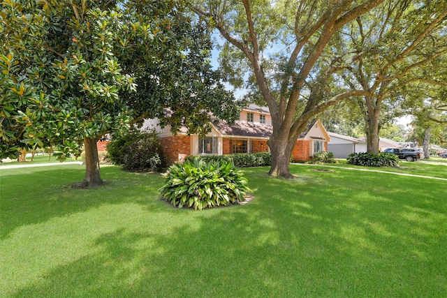 view of front of home with a front yard