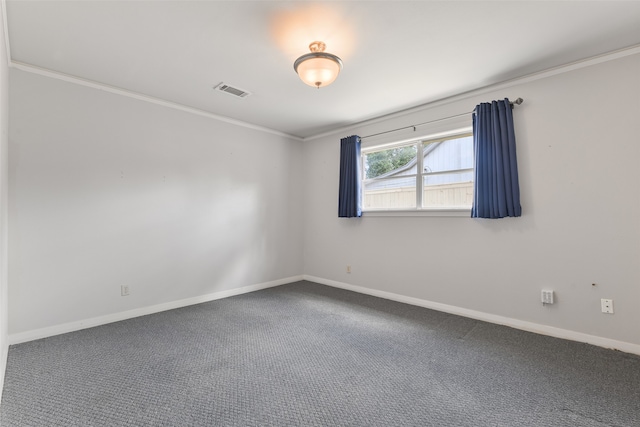 spare room featuring carpet floors and ornamental molding