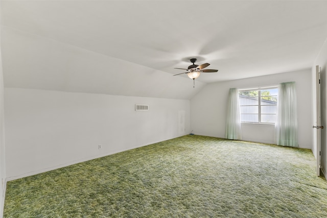 bonus room featuring carpet flooring, ceiling fan, and vaulted ceiling