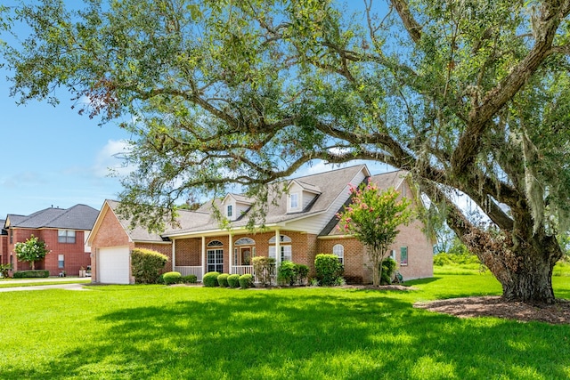 cape cod house featuring a front lawn, a garage, and covered porch