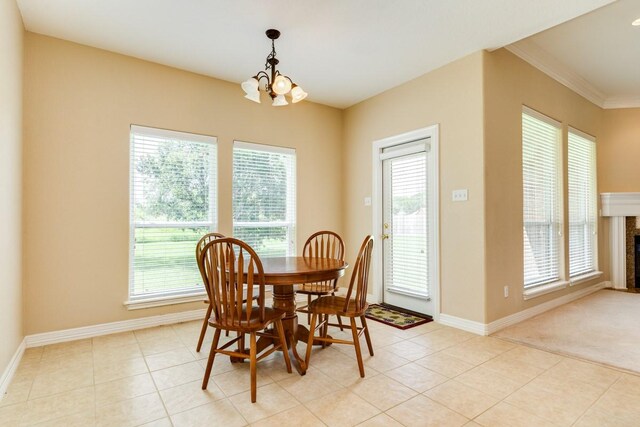 dining space featuring plenty of natural light and light tile patterned floors