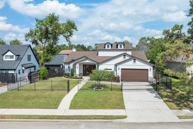 view of front of home with a front lawn and a garage