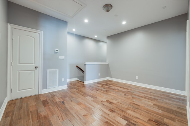 unfurnished room with light hardwood / wood-style floors