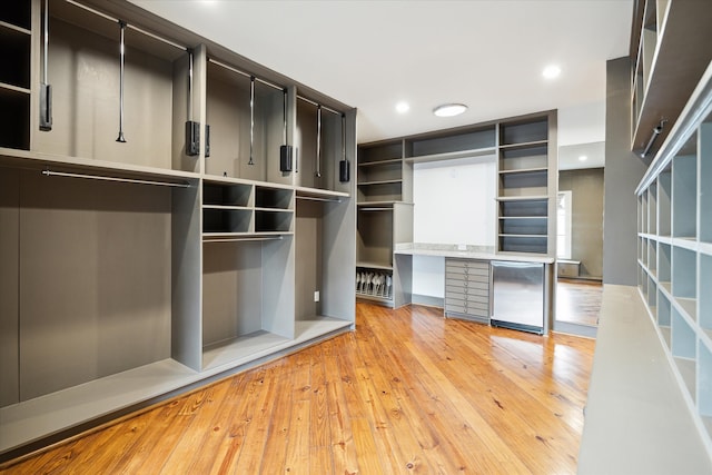 walk in closet featuring light hardwood / wood-style floors