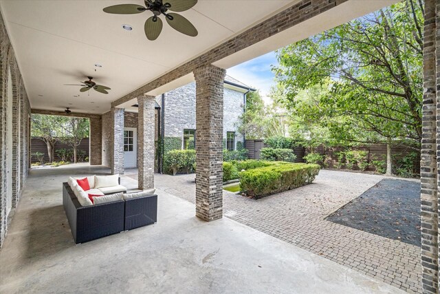 view of patio with ceiling fan and outdoor lounge area