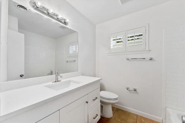 full bathroom featuring tile patterned floors, vanity, shower / bathing tub combination, and toilet