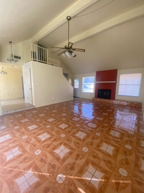 unfurnished living room featuring ceiling fan, beam ceiling, high vaulted ceiling, and light tile patterned floors