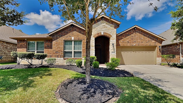 ranch-style home with brick siding, concrete driveway, an attached garage, stone siding, and a front lawn