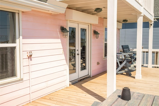 wooden terrace featuring french doors