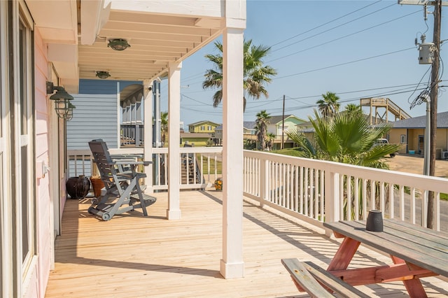 wooden deck with a residential view