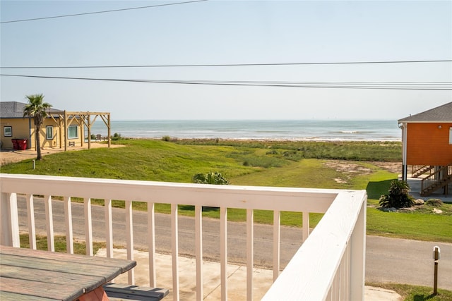 balcony featuring a water view