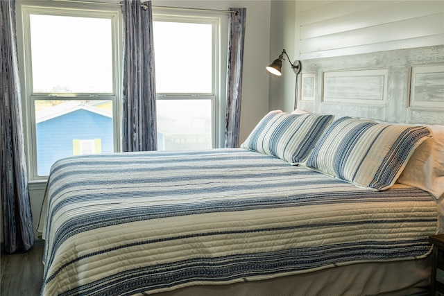 bedroom with wood-type flooring