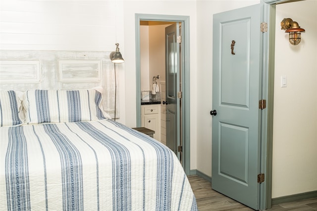 bedroom featuring hardwood / wood-style flooring