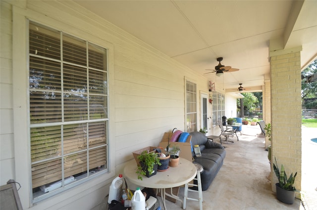 view of patio featuring ceiling fan