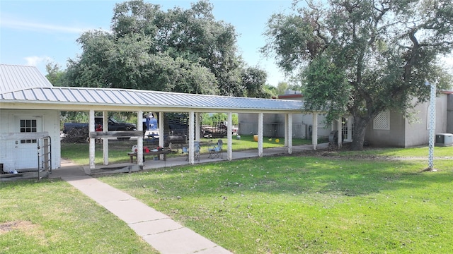 surrounding community featuring a lawn