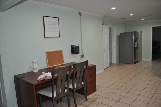 office space with light tile patterned floors and ornamental molding