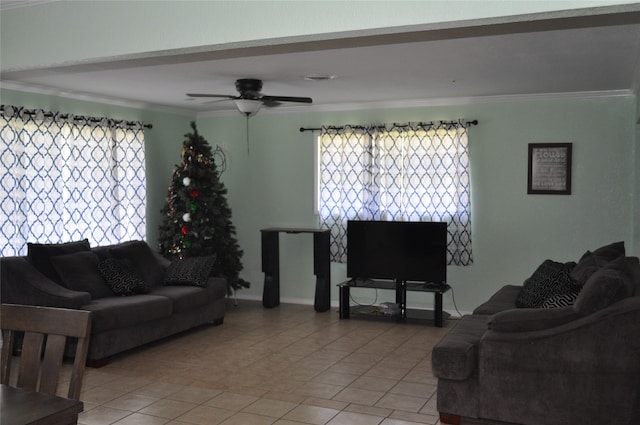 tiled living room featuring ceiling fan and crown molding