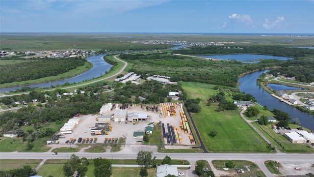 3315 Fm 523rd Rd, Oyster Creek, TX 77541 - drone / aerial view with a water view