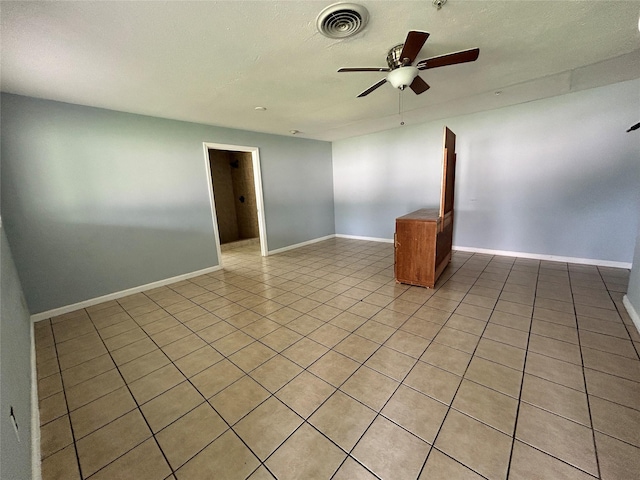3315 Fm 523rd Rd, Oyster Creek, TX 77541 - empty room featuring light tile patterned flooring, visible vents, ceiling fan, and baseboards