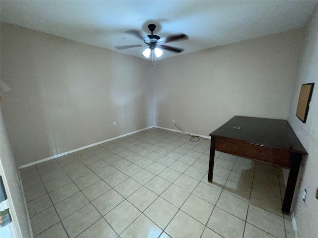 3315 Fm 523rd Rd, Oyster Creek, TX 77541 - spare room featuring baseboards, light tile patterned floors, and ceiling fan