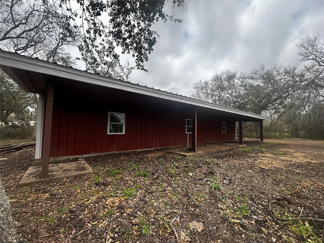 3315 Fm 523rd Rd, Oyster Creek, TX 77541 - view of property exterior featuring metal roof