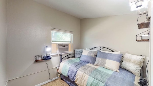 carpeted bedroom featuring cooling unit