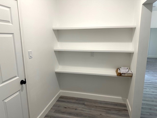 24629 Waterford St, Hempstead, TX 77445 - interior details with baseboards and wood finished floors