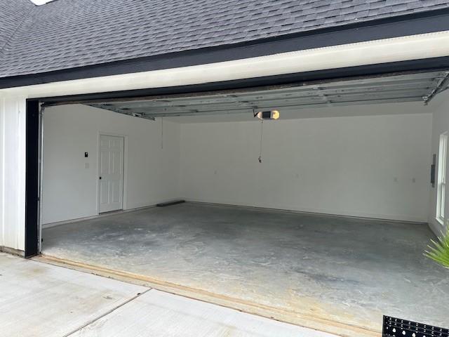 24629 Waterford St, Hempstead, TX 77445 - garage featuring a garage door opener