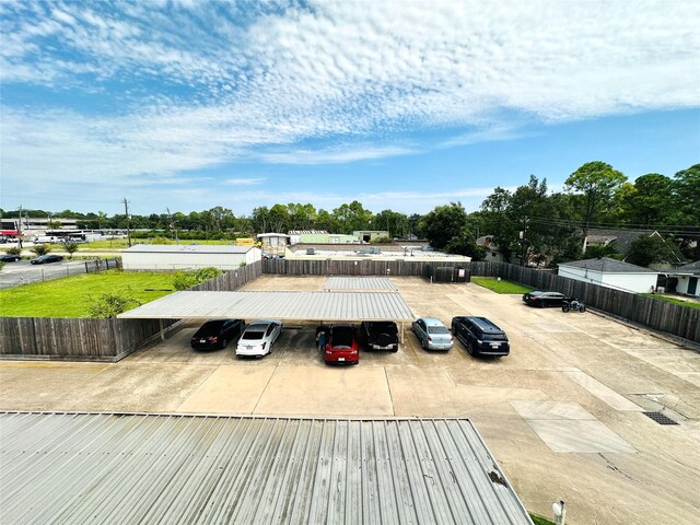 view of front of property featuring a carport