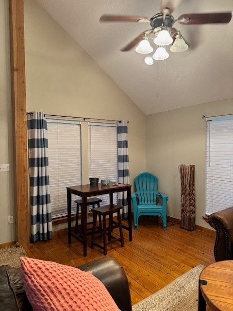 interior space featuring ceiling fan, vaulted ceiling, and hardwood / wood-style floors