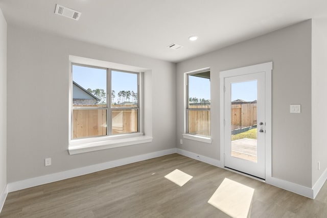 interior space with light hardwood / wood-style flooring