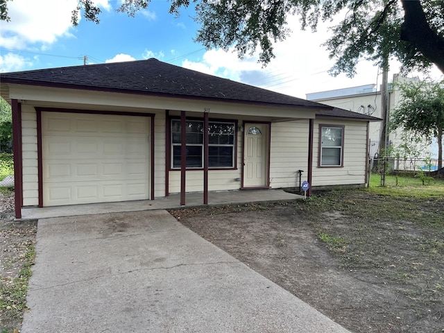 ranch-style house with a garage