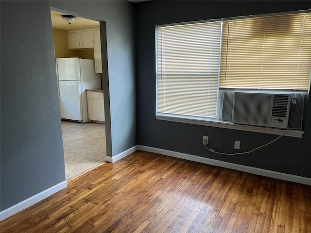 empty room featuring light hardwood / wood-style floors