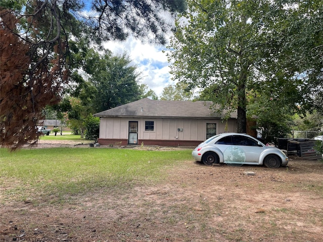 view of home's exterior featuring a yard