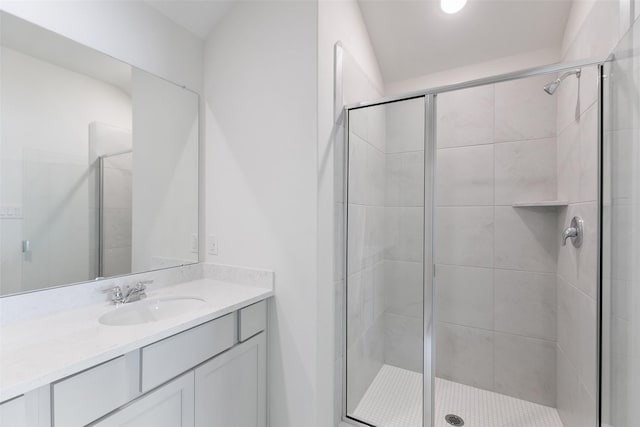 bathroom featuring vanity and walk in shower